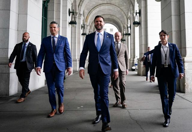 (FILES) US Defense Secretary Pete Hegseth (2nd-L) US Vice President JD Vance (C) and US White House deputy chief of staff Stephen Miller (2nd-R) arrive to greet members of the National Guard at Union Station in Washington, DC on August 20, 2025. According to US media reports on August 27, the US Department of Transportation is planning to take over management of Union Station in Washington, DC. (Photo by AL DRAGO / POOL / AFP)