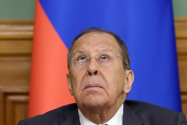 Russia's Foreign Minister Sergei Lavrov looks up as he attends a press conference with Turkmenistan's Foreign Minister Rashid Meredov (not pictured) following their talks in Moscow, on August 28, 2025. (Photo by Ramil Sitdikov / POOL / AFP)