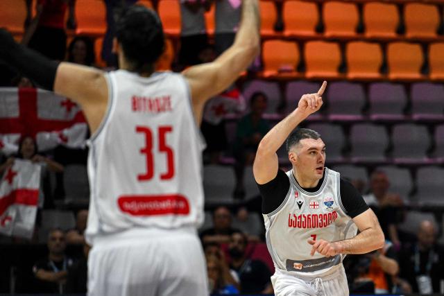 Georgia's power forward #07 Beka Burkhanadze reacts after scoring during the FIBA EuroBasket 2025 basketball match between Georgia and Spain at Spyros Kyprianou Arena in Limassol on August 28, 2025. (Photo by Jewel SAMAD / AFP)
