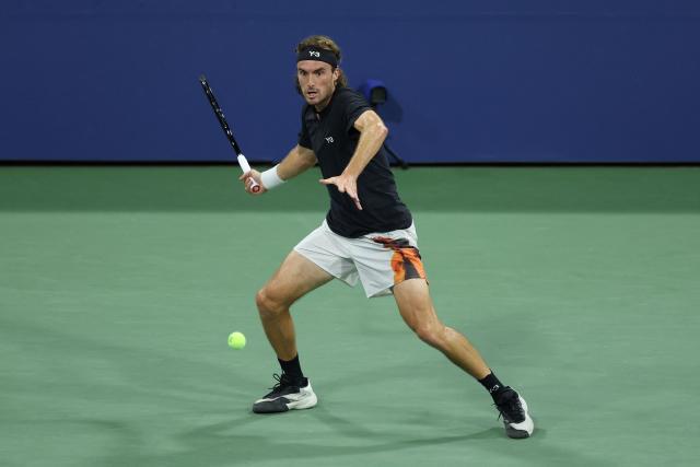 Greece’s Stefanos Tsitsipas hits a forehand return to Germany’s Daniel Altmaier during their men's singles second round tennis match on day five of the US Open tennis tournament at the USTA Billie Jean King National Tennis Center in New York City, on August 28, 2025. (Photo by CHARLY TRIBALLEAU / AFP)