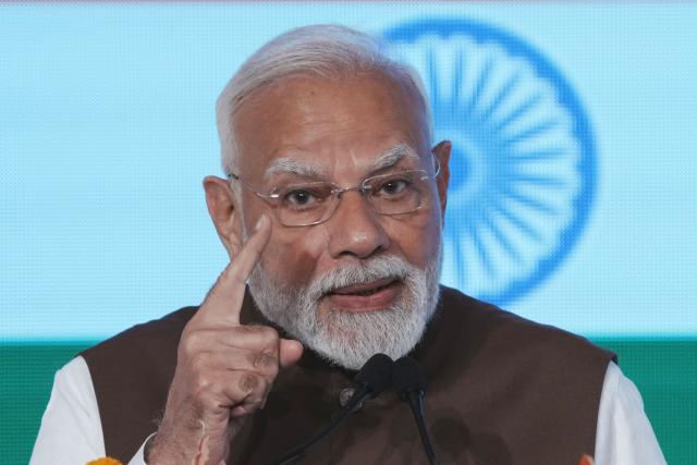 India's Prime Minister Narendra Modi delivers a speech at the Japan-India Economic Forum in Tokyo on August 29, 2025. (Photo by Kazuhiro NOGI / AFP)