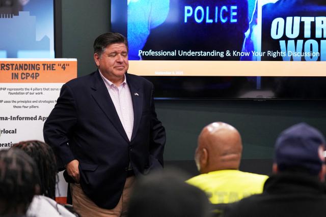 Illinois Gov. JB Pritzker meets with community violence intervention (CVI) leaders as they hold an emergency response training to prepare for federal deployments in Chicago, Illinois, on September 3, 2025. US President Donald Trump said on September 2 that he will deploy National Guard troops to Chicago, calling the Democratic-run midwestern city a "hellhole" ravaged by gun crime. (Photo by Nam Y. Huh / POOL / AFP)