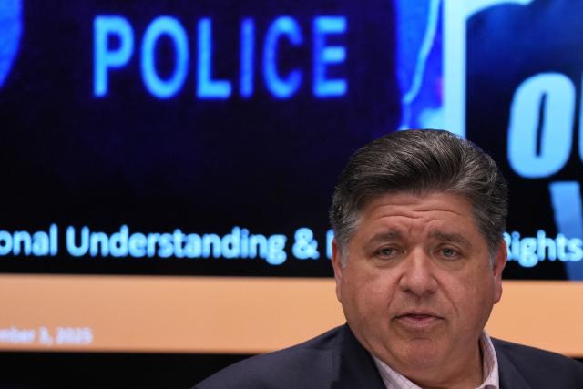 Illinois Gov. JB Pritzker meets with community violence intervention (CVI) leaders as they hold an emergency response training to prepare for federal deployments in Chicago, Illinois, on September 3, 2025. US President Donald Trump said on September 2 that he will deploy National Guard troops to Chicago, calling the Democratic-run midwestern city a "hellhole" ravaged by gun crime. (Photo by Nam Y. Huh / POOL / AFP)