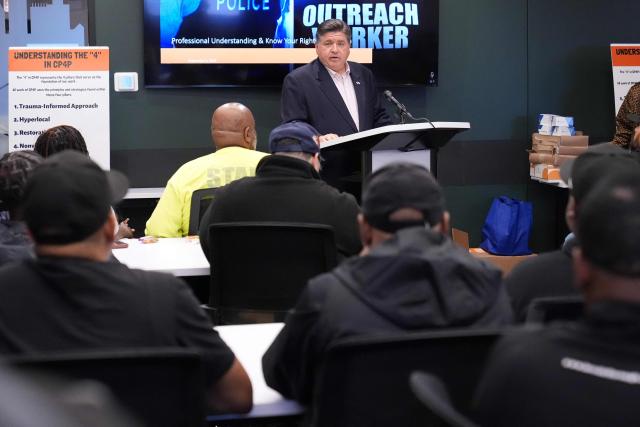 Illinois Gov. JB Pritzker meets with community violence intervention (CVI) leaders as they hold an emergency response training to prepare for federal deployments in Chicago, Illinois, on September 3, 2025. US President Donald Trump said on September 2 that he will deploy National Guard troops to Chicago, calling the Democratic-run midwestern city a "hellhole" ravaged by gun crime. (Photo by Nam Y. Huh / POOL / AFP)