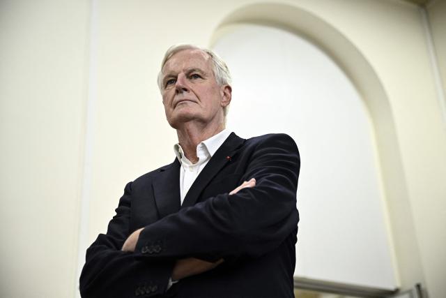 Former Prime minister Michel Barnier is seen during a campaign meeting for the parliamentary by-elections for Paris'  2nd electoral circonscription in Paris, on September 4, 2025. (Photo by JULIEN DE ROSA / AFP)
