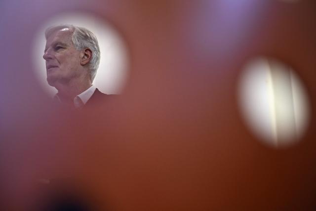 Former Prime minister Michel Barnier is seen during a campaign meeting for the parliamentary by-elections for Paris'  2nd electoral circonscription in Paris, on September 4, 2025. (Photo by JULIEN DE ROSA / AFP)