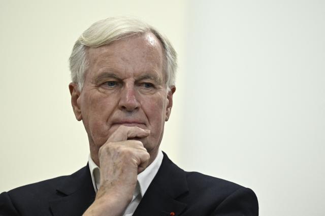 Former Prime minister Michel Barnier is seen during a campaign meeting for the parliamentary by-elections for Paris'  2nd electoral circonscription in Paris, on September 4, 2025. (Photo by JULIEN DE ROSA / AFP)