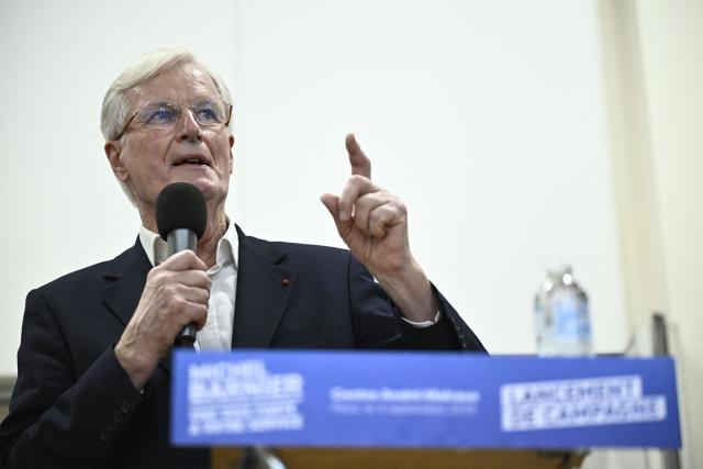 Former Prime minister Michel Barnier delivers a speech during a campaign meeting for the parliamentary by-elections for Paris'  2nd electoral circonscription in Paris, on September 4, 2025. (Photo by JULIEN DE ROSA / AFP)
