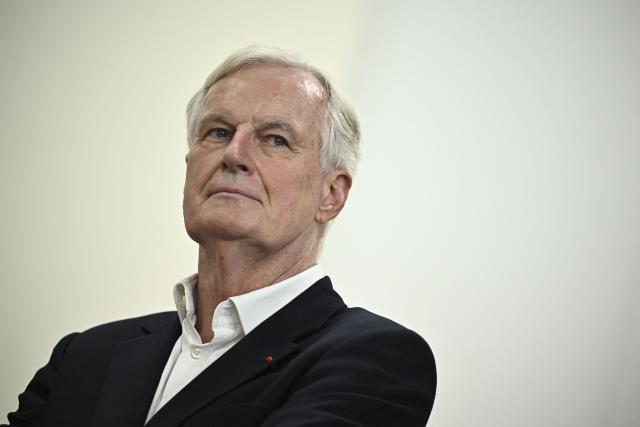 Former Prime minister Michel Barnier is seen during a campaign meeting for the parliamentary by-elections for Paris'  2nd electoral circonscription in Paris, on September 4, 2025. (Photo by JULIEN DE ROSA / AFP)