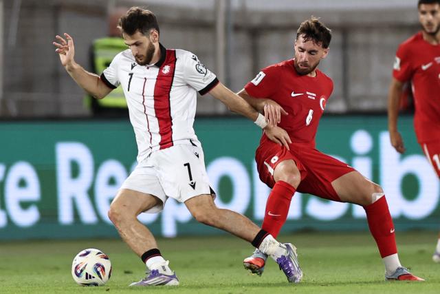 Georgia's midfielder Khvicha Kvaratskhelia in action during the 2026 FIFA World Cup qualifying football match between Georgia and Turkey in Tbilisi on September 4, 2025. (Photo by Giorgi ARJEVANIDZE / AFP)