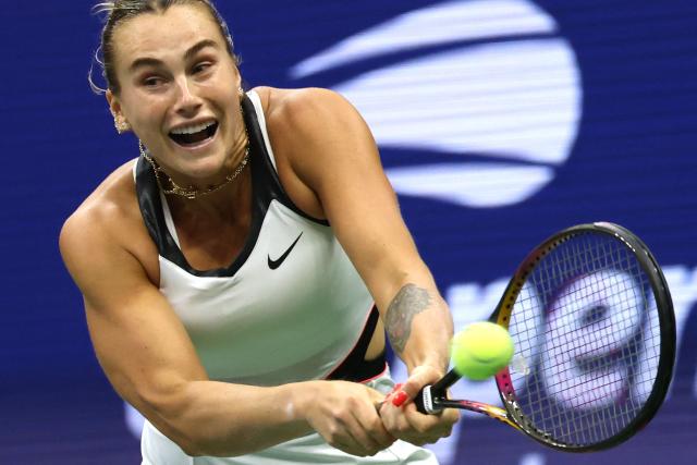 Belarus's Aryna Sabalenka plays a forehand return to USA's Amanda Anisimova during their women's singles final tennis match on day fourteen of the US Open tennis tournament at the USTA Billie Jean King National Tennis Center in New York City, on September 6, 2025. (Photo by TIMOTHY A.CLARY / AFP)