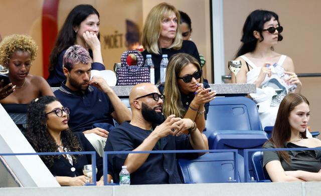 US rapper Common watches the women's singles final tennis match between Belarus's Aryna Sabalenka and USA's Amanda Anisimova on day fourteen of the US Open tennis tournament at the USTA Billie Jean King National Tennis Center in New York City, on September 6, 2025. (Photo by KENA BETANCUR / AFP)
