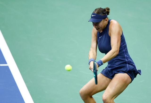 USA's Amanda Anisimova plays a shot to Belarus's Aryna Sabalenka during the women's singles final tennis match on day fourteen of the US Open tennis tournament at the USTA Billie Jean King National Tennis Center in New York City on September 6, 2025. (Photo by KENA BETANCUR / AFP)