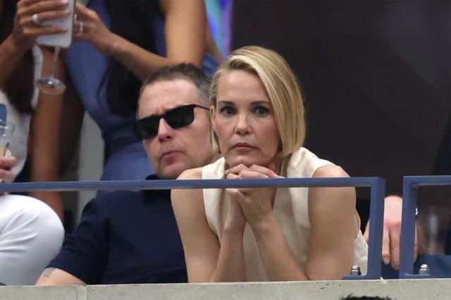 US actress Leslie Bibb and US actor Sam Rockwell attend the women's singles final tennis match between Belarus's Aryna Sabalenka and USA's Amanda Anisimova on day fourteen of the US Open tennis tournament at the USTA Billie Jean King National Tennis Center in New York City, on September 6, 2025. (Photo by Timothy A. CLARY / AFP)