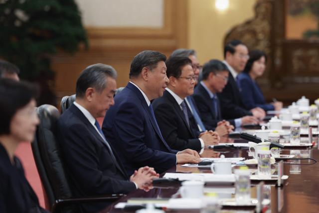 Chinese President Xi Jinping speaks at the beginning of a bilateral meeting with Portuguese Prime Minister Luis Montenegro (not pictured) at The Great Hall of the People in Beijing on September 9, 2025. (Photo by Lintao Zhang / POOL / AFP)