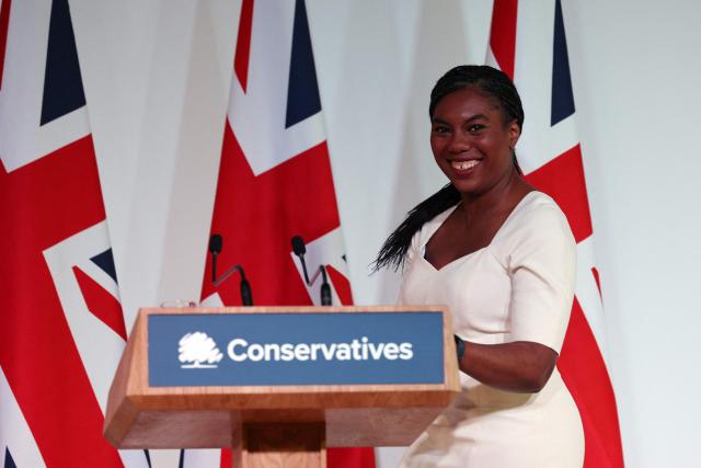 Britain's main opposition Conservative Party leader Kemi Badenoch takes the stage to deliver a speech in front of Union flags at the Institute of Chartered Accountants' Hall, in central London on September 9, 2025. (Photo by Adrian Dennis / AFP)