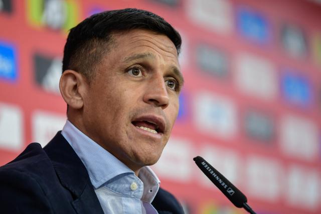 Sevilla FC's new Chiliean international forward Alexis Sanchez speaks during his official presentation at the Ramon Sanchez Pizjuam stadium in Seville on September 9, 2025. (Photo by CRISTINA QUICLER / AFP)