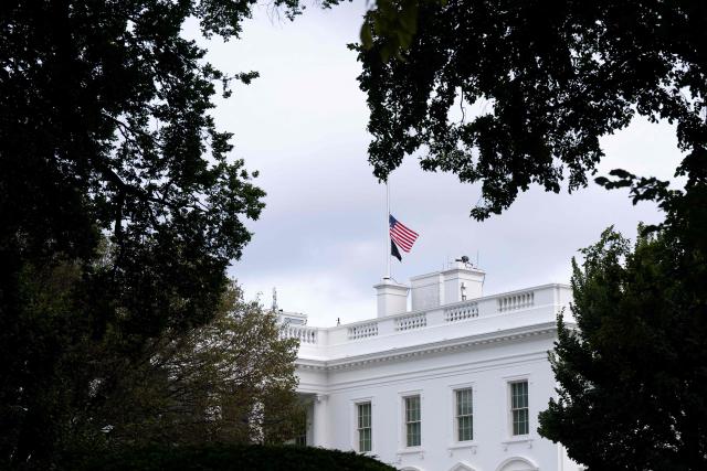The US flag flies at half-staff on the roof of the White House in honor of conservative commentator Charlie Kirk who was shot and killed earlier today in Utah, in Washington, DC, on September 10, 2025. (Photo by SAUL LOEB / AFP)
