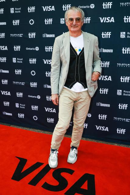 French filmmaker Olivier Assayas attends the premiere of "The Wizard of the Kremlin" at Princess of Wales Theatre, during the Toronto International Film Festival (TIFF) in Toronto, Ontario, on September 10, 2025. (Photo by Cole BURSTON / AFP)