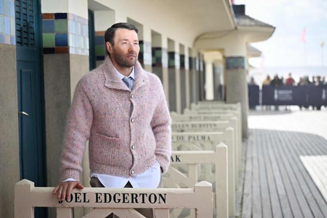US director Joel Edgerton poses after unveilinghis name on the "Planches of Deauville", on the sidelines of the 51st edition of the Deauville American film festival, in Deauville, northwestern France, on September 11, 2025. (Photo by Lou BENOIST / AFP)