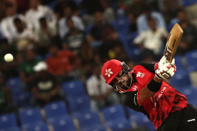 TOPSHOT - Hong Kong's Zeeshan Ali plays a shot during the Asia Cup 2025 Twenty20 international cricket match between Bangladesh and Hong Kong at the Sheikh Zayed Cricket Stadium in Abu Dhabi on September 11, 2025. (Photo by Fadel SENNA / AFP)