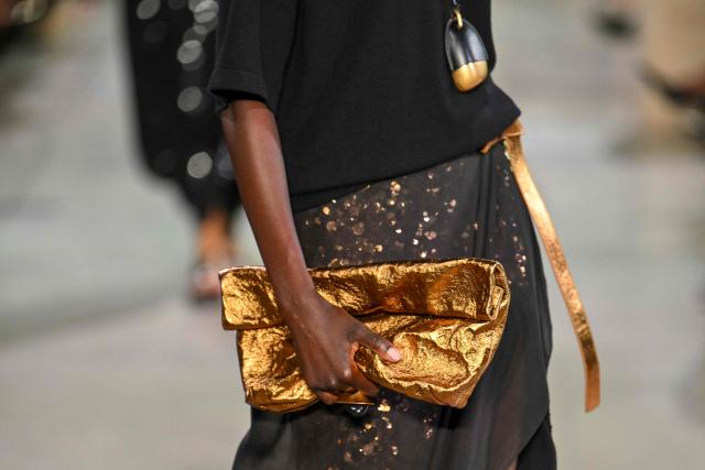 Models walk the runway during the Michael Kors Spring/Summer 2026 collection show on September 10, 2025 in New York City. (Photo by ANGELA WEISS / AFP)