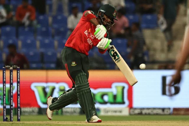 Bangladesh's Tanzid Hasan plays a shot during the Asia Cup 2025 Twenty20 international cricket match between Bangladesh and Hong Kong at the Sheikh Zayed Cricket Stadium in Abu Dhabi on September 11, 2025. (Photo by Fadel SENNA / AFP)