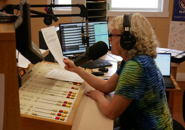Volunteer Bonnie Ralston hosts a show in the Allegheny Mountain Radio studio, in Monterey, Virginia, on September 2, 2025. Allegheny Mountain Radio is one of the many stations across the United States imperiled by President Donald Trump's funding cuts. At Trump's request, Republicans in Congress voted to cut federal money for the Corporation for Public Broadcasting, the key funding source for National Public Radio (NPR) and the Public Broadcasting Service (PBS), both of which conservatives have long accused of liberal bias. (Photo by Pierre HARDY / AFP)