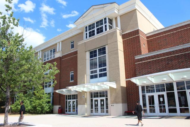 An exterior view of Alexandria City High School, where US track and field athlete Noah Lyles graduated from, in Alexandria, Virginia, on August 25, 2025. The trophies line the halls of the small high school which Noah Lyles, the future Olympic 100 metres champion and the man bidding for double gold at the world championships in Tokyo this month, attended. The young Lyles spoke little but took everything in. Lyles began attending Alexandria High School aged 14. His athletic prowess soon became the stuff of legend here. His parents, both high-level college athletes themselves but recently separated, constantly pushed him to do more and go faster and he excelled. (Photo by Paul NOLP / AFP)