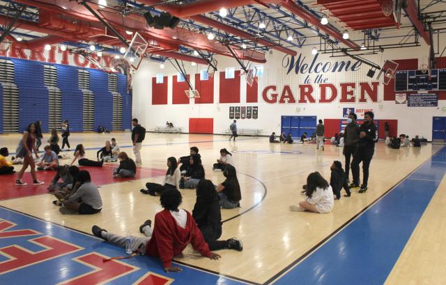 A view of the gynmasium at Alexandria City High School, where US track and field athlete Noah Lyles used to train when he was younger, in Alexandria, Virginia, on August 25, 2025. The trophies line the halls of the small high school which Noah Lyles, the future Olympic 100 metres champion and the man bidding for double gold at the world championships in Tokyo this month, attended. The young Lyles spoke little but took everything in. Lyles began attending Alexandria High School aged 14. His athletic prowess soon became the stuff of legend here. His parents, both high-level college athletes themselves but recently separated, constantly pushed him to do more and go faster and he excelled. (Photo by Paul NOLP / AFP)