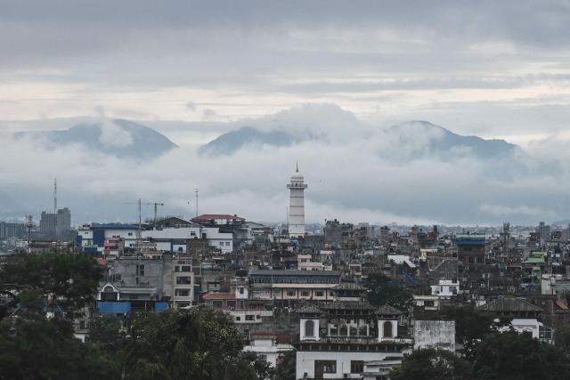 A general view of the city shows residential houses amid ongoing unrest in Kathmandu on September 12, 2025. The army has imposed a curfew in the Himalayan nation of 30 million people, with soldiers patrolling the largely quiet streets after the worst violence in two decades. (Photo by Arun SANKAR / AFP)