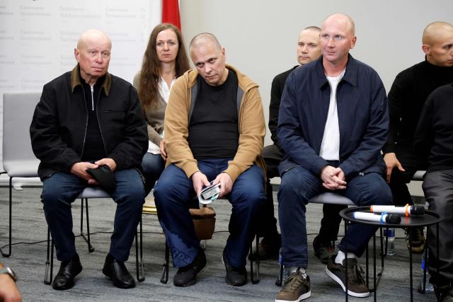 Newspaper editor Aliaksandr Mantsevich (front row, L), Belsat Shchyrakova (back row L), journalist Yauhen Merkis (front R) look on during a press conference with exiled Belarusian opposition leader Tikhanovskaya and other freed political prisoners in Vilnius on September 12, 2025, a day after Belarus freed 52 political prisoners in a release mediated by the United States. Among those released are an EU staff member, journalists, and dissidents. Many were detained during a brutal crackdown and later prosecuted on what rights groups denounced as politically motivated charges. (Photo by Petras Malukas / AFP)