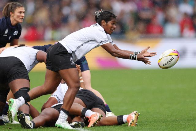 Fiji's scrum half Setaita Railumu passes the ball during the Women’s Rugby World Cup pool B match between Scotland and Fiji at Salford Community Stadium, Manchester, northwest England, on August 30, 2025. (Photo by Adrian Dennis / AFP)