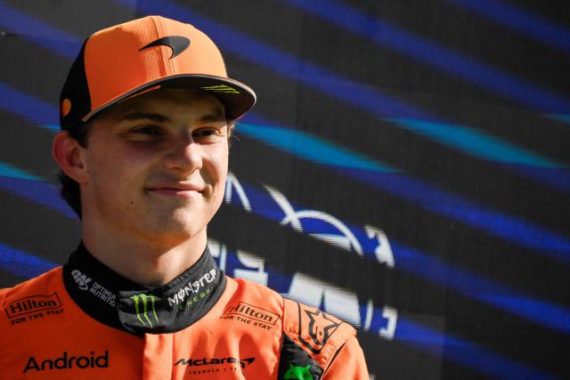 McLaren's Australian driver Oscar Piastri smiles after winning the pole position during the qualifying session of the Formula One Dutch Grand Prix at The Circuit Zandvoort, western Netherlands, on August 30, 2025. (Photo by JOHN THYS / AFP)