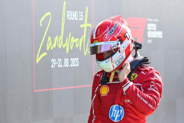 Six-placed Ferrari's Monegasque driver Charles Leclerc looks down after the qualifying session of the Formula One Dutch Grand Prix at The Circuit Zandvoort, western Netherlands, on August 30, 2025. (Photo by JOHN THYS / AFP)