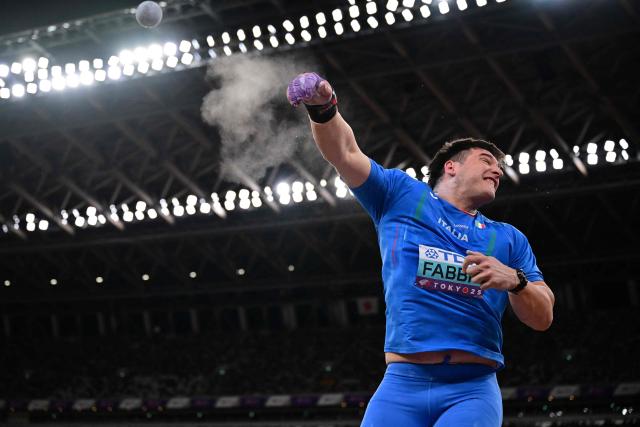 Italy's athlete Leonardo Fabbri competes in the men's shot put final during the World Athletics Championships in Tokyo on September 13, 2025. (Photo by Ben STANSALL / AFP)