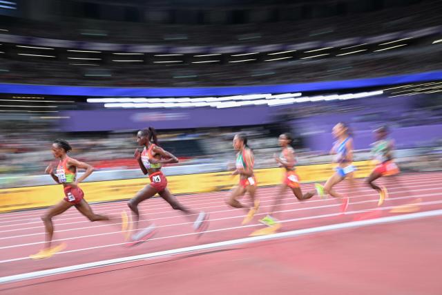 Kenya's athlete Beatrice Chebet (L) leads in the women's 10000m final during the World Athletics Championships in Tokyo on September 13, 2025. (Photo by Kirill KUDRYAVTSEV / AFP)