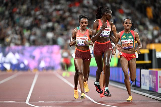 (From L) Kenya's Beatrice Chebet, Kenya's athlete Agnes Jebet Ngetich and Ethiopia's Gudaf Tsegay compete in the women's 10000m final during the World Athletics Championships in Tokyo on September 13, 2025. (Photo by Jewel SAMAD / AFP)