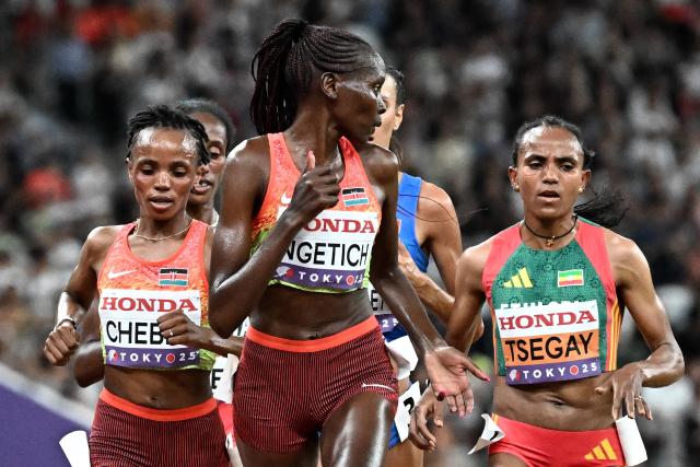 Kenya's Beatrice Chebet (L), Kenya's athlete Agnes Jebet Ngetich and Ethiopia's Gudaf Tsegay compete in the women's 10000m final during the World Athletics Championships in Tokyo on September 13, 2025. (Photo by Jewel SAMAD / AFP)
