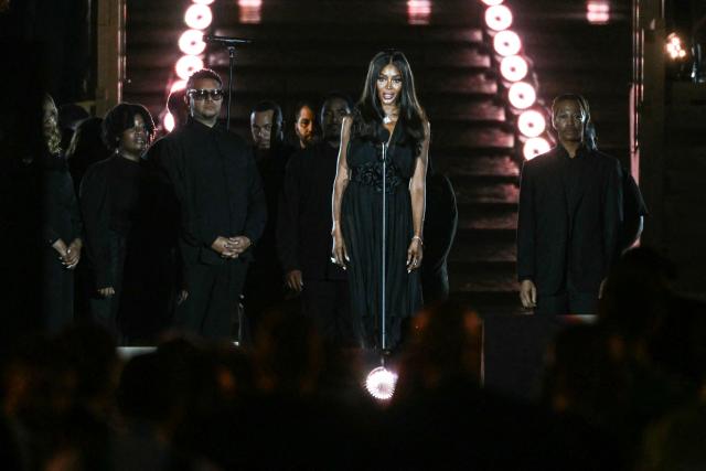 British supermodel Naomi Campbell performs onstage during "Grace for the World" free concert and light show in Saint Peter's Square at the Vatican on September 13, 2025. "Grace for the World" concert is co-directed by American songwriter Pharrell Williams and Italian tenor Andrea Bocelli. The event marks the end of the third "World Meeting on Human Fraternity", a series of encounters launched after the 2020 publication of the "All Brothers" encyclical by the late pope Francis. (Photo by Filippo MONTEFORTE / AFP)