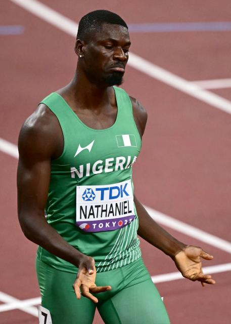 Nigeria's athlete Ezekiel Nathaniel reacts after competing in the men's 400m hurdles heats during the World Athletics Championships in Tokyo on September 15, 2025. (Photo by Yuichi YAMAZAKI / AFP)