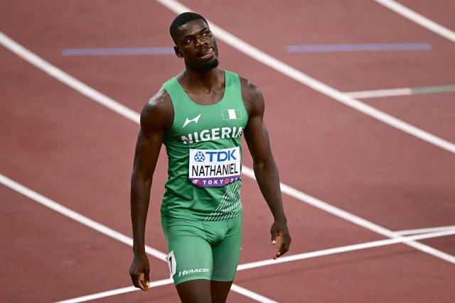 Nigeria's athlete Ezekiel Nathaniel reacts after competing in the men's 400m hurdles heats during the World Athletics Championships in Tokyo on September 15, 2025. (Photo by Yuichi YAMAZAKI / AFP)