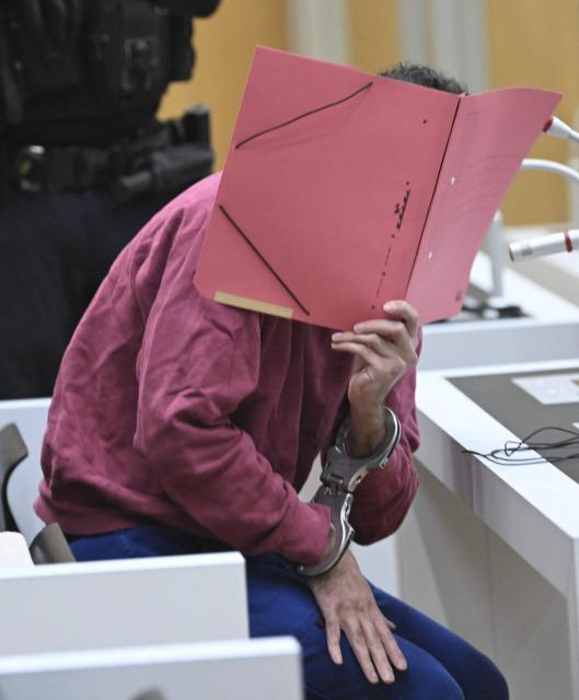 (FILES) The defendant sits in the courtroom of the Higher Regional Court in Stuttgart-Stammheim, southern Germany, on February 13, 2025, before the start of his trial for murdering a police officer and attempting to murder five others at the market square in Mannheim on May 31, 2024. On September 16, 2025, the verdict is expected in the trial of an Afghan man accused of a deadly jihadist stabbing, during which a police officer was killed, and for attempting to murder five others at the market square in Mannheim, southwestern Germany on May 31, 2024. (Photo by THOMAS KIENZLE / POOL / AFP)