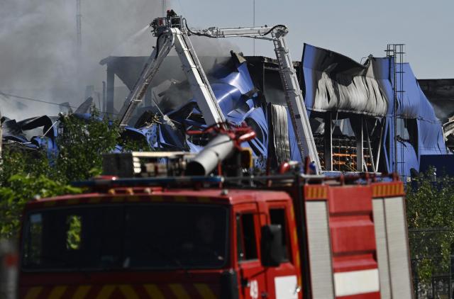 A Ukrainian firefighter vehicle is seen at the site of a fire following a drone attack at an undisclosed location in Fastiv district in the Kyiv region on September 16, 2025, amid the Russian invasion of Ukraine. (Photo by Genya SAVILOV / AFP)