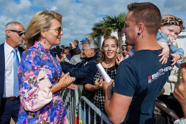 Queen Mathilde of Belgium greets people at the promenade in front of the Kursaal Oostende Casino, part of a royal visit to the province of West Flanders, in Oostende, September 16, 2025. (Photo by KURT DESPLENTER / Belga / AFP) / Belgium OUT