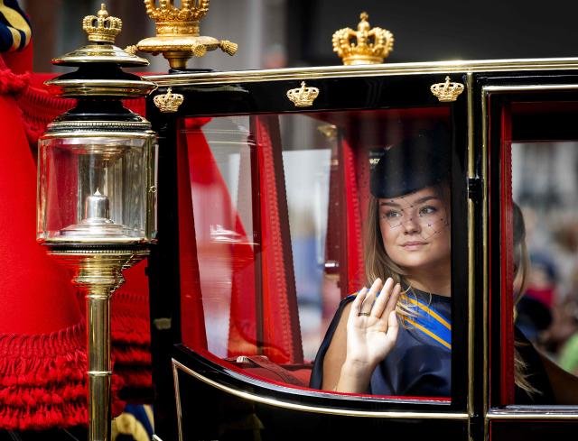 Princess Ariane  of the Netherlands sits in the carriage as she arrives at Noordeinde Palace from the Royal Theatre during Prinsjesdag (Prince's Day), in The Hague, on September 16, 2025. Prince's Day, also known as Budget Day, is the traditional opening of the Dutch parliamentary year, with the King delivering the "Speech from the Throne". (Photo by Sem van der Wal / ANP / AFP) / Netherlands OUT