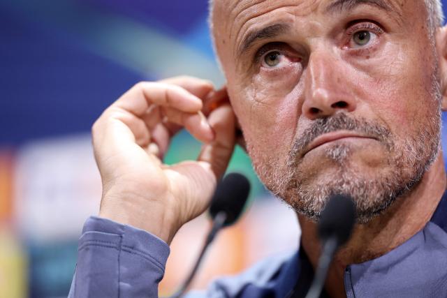Paris Saint-Germain's Spanish head coach Luis Enrique reacts as he speaks during a conference at the Campus Paris Saint-Germain in Poissy, in the western outskirts of Paris, on September 16, 2025, on the eve of the UEFA Champions League first round day 1 football match between Paris Saint-Germain and Atalanta. (Photo by FRANCK FIFE / AFP)