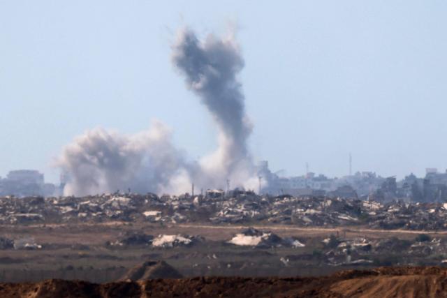 This picture taken from a position at Israel's border with the Gaza Strip shows smoke billowing amid Israeli bombardment of the besieged Palestinian territory on September 16, 2025. Israel launched its ground assault on Gaza City before dawn on September 16, shortly after US Secretary of State Marco Rubio's visit expressing robust support for the offensive, while a United Nations probe charged Israel with committing "genocide" in the Palestinian territory and accused its Prime Minister and other top officials of incitement. (Photo by Menahem Kahana / AFP)