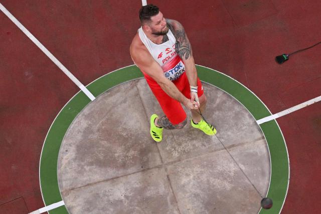 Poland's athlete Pawel Fajdek competes in the men's hammer throw final during the World Athletics Championships in Tokyo on September 16, 2025. (Photo by Antonin THUILLIER / POOL / AFP)