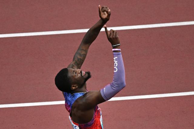 US' athlete Cordell Tinch celebrates after winning the men's 110m hurdles final during the World Athletics Championships in Tokyo on September 16, 2025. (Photo by Philip FONG / AFP)